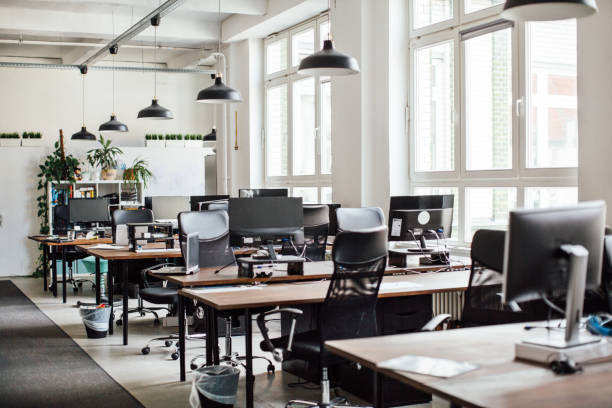 Interior of modern office with empty desk.